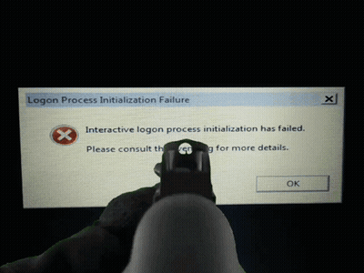 A Person Is Holding A Gun In Front Of A Logon Process Initialization Failure Screen GIF