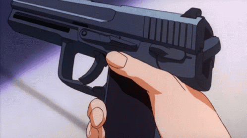 A Person Is Holding A Gun In Their Hand With Their Finger On The Trigger GIF