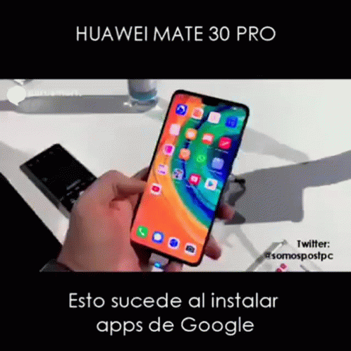 A Person Is Holding A Huawei Mate 30 Pro Phone In Their Hand GIF