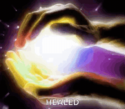 A Person Is Holding A Light In Their Hands And The Word Healed Is On The Bottom Of The Image GIF