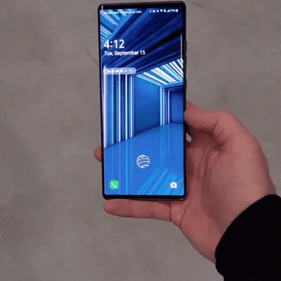 A Person Is Holding A Phone That Says 4:12 Tuesday September 15Th GIF