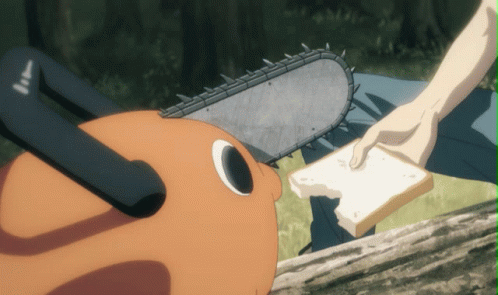 A Person Is Holding A Piece Of Bread In Front Of A Chainsaw That Has The Number 11 On It GIF