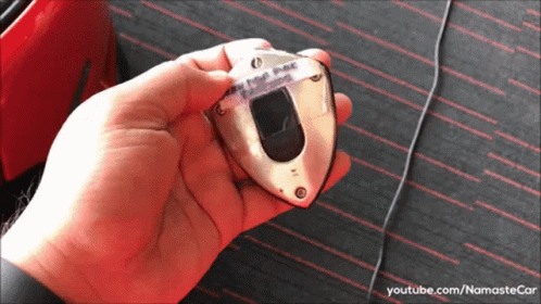 A Person Is Holding A Piece Of Metal In Their Hand With Youtube.com/namastecar In The Lower Right Corner GIF