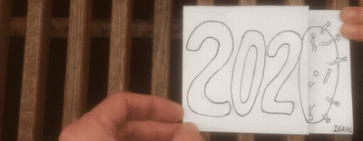 A Person Is Holding A Piece Of Paper That Says ' 2021 ' On It GIF