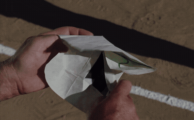 A Person Is Holding A Piece Of Paper That Says I Am On It GIF