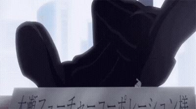 A Person Is Holding A Piece Of Paper With Japanese Writing On It . GIF