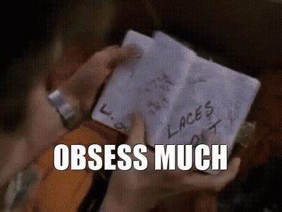 A Person Is Holding A Piece Of Paper With Laces Written On It GIF