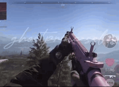 A Person Is Holding A Pink Gun In Their Hands In A Video Game . GIF