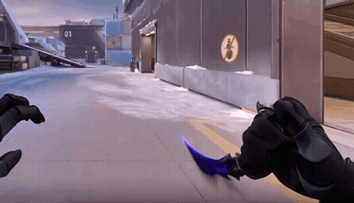 A Person Is Holding A Purple Knife In A Video Game . GIF