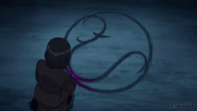 A Person Is Holding A Purple Object In Their Hand In A Purple Light . GIF