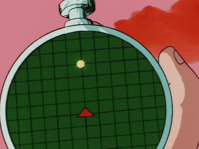A Person Is Holding A Radar With A Red Triangle Pointing To The Left GIF