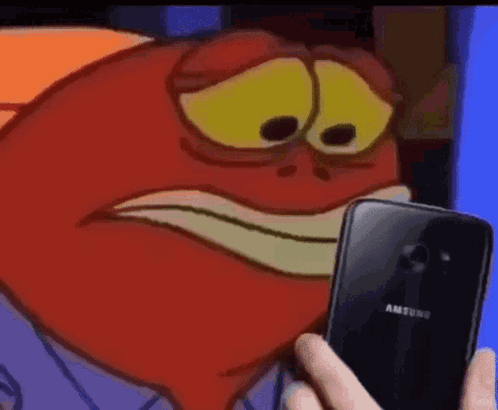 A Person Is Holding A Samsung Phone In Front Of A Red Cartoon Character . GIF