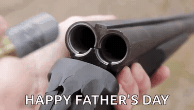 A Person Is Holding A Shotgun In Their Hands With The Words `` Happy Father 'S Day '' Written On It . GIF