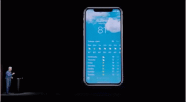 A Person Is Holding A Smart Phone In Their Hand And Pressing A Button On The Screen . GIF