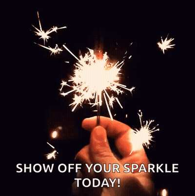 A Person Is Holding A Sparkler In Their Hand And Says Show Off Your Sparkle Today . GIF