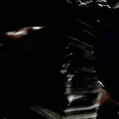 A Person Is Holding A Stack Of 100 Dollar Bills In Their Hand GIF