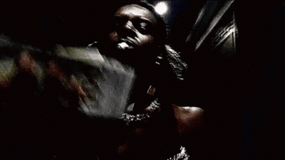 A Person Is Holding A Stack Of 100 Dollar Bills GIF