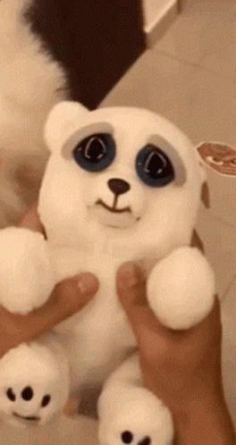 Person Holding Sad Polar Bear Plush GIF