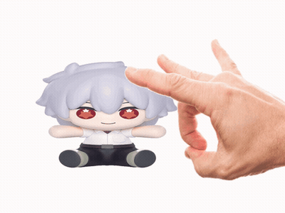 A Person Is Holding A Stuffed Toy With A Red Star On Its Eyes GIF