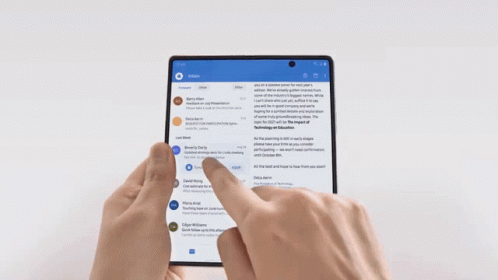 A Person Is Holding A Tablet With David W On It GIF