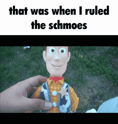 A Person Is Holding A Toy That Says That Was When I Ruled The Schmoes On It GIF