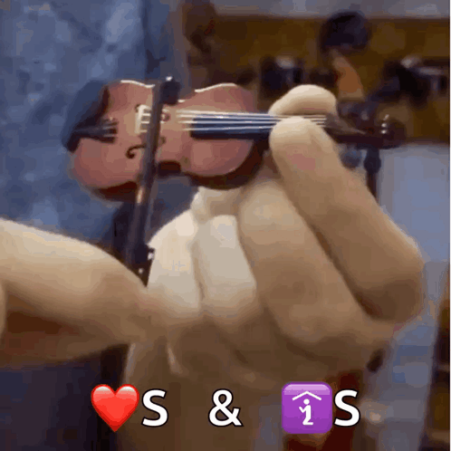 A Person Is Holding A Violin With The Letters S & I Visible GIF