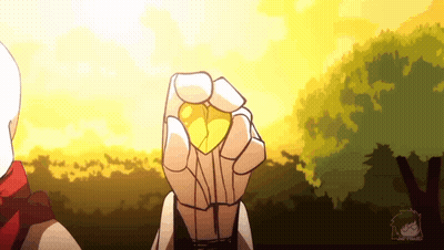 A Person Is Holding A Yellow Object In Their Hand In Front Of A Sunset . GIF