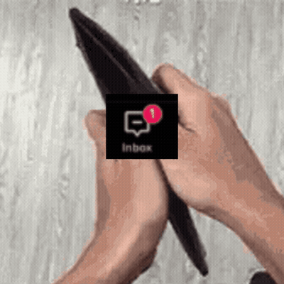 A Person Is Holding An Empty Wallet With An Inbox Notification On The Screen . GIF