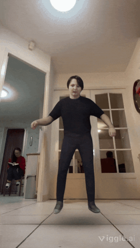 A Person Is Jumping In The Air With The Words Viggle.ai Below GIF
