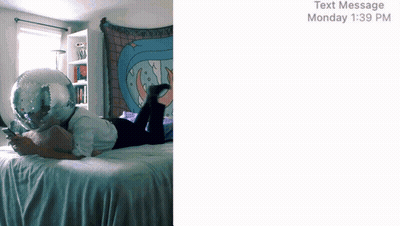 A Person Is Laying On A Bed With A Disco Ball On Their Head GIF
