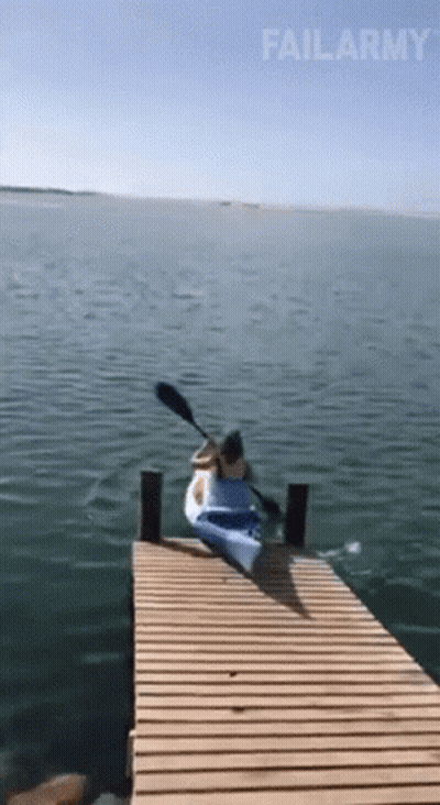 A Person Is Paddling A Kayak On A Dock And Failarmy Is Written On The Bottom GIF