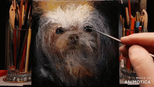 A Person Is Painting A Dog On A Canvas With The Words Made In Animotica Visible GIF