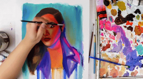 A Person Is Painting A Portrait Of A Woman GIF