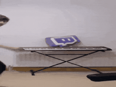 A Person Is Playing A Keyboard With A Twitch Logo On It GIF