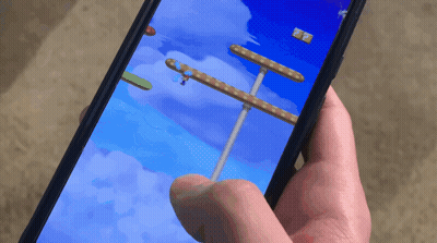 A Person Is Playing A Video Game On Their Phone With A Score Of 27 GIF