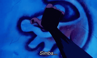 A Person Is Pointing At A Drawing Of A Lion And The Word Simba Is Below It GIF