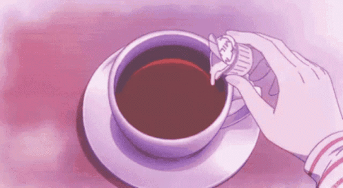 A Person Is Pouring Sugar Into A Cup Of Coffee On A Pink Background . GIF