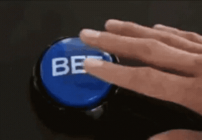 A Person Is Pressing A Blue Button With Their Finger That Says Be . GIF
