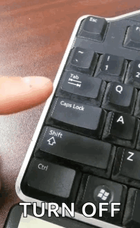 A Person Is Pressing The Shift Key On A Keyboard With The Words Turn Off Below It GIF
