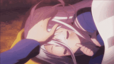 A Person Is Putting Their Hand On A Girl 'S Head . GIF