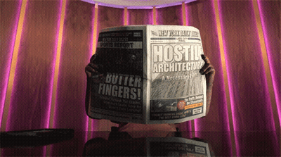 A Person Is Reading A Newspaper With The Title Hostile Architecture GIF