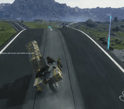 A Person Is Riding A Motorcycle Down A Road With Mountains In The Background And The Number 1 On The Right GIF