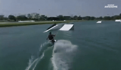 A Person Is Riding A Wakeboard On A Ramp And The Words Awesome Are On The Bottom Of The Screen GIF