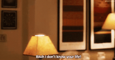 A Person Is Sitting In A Living Room With A Lamp And Saying Bitch I Do N't Know Your Life . GIF