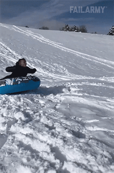 A Person Is Sliding Down A Snow Covered Hill On A Tube With Failarmy Written On The Bottom GIF