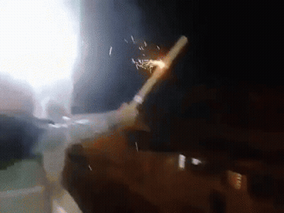 A Person Is Smoking A Cigarette With A Straw In Their Mouth . GIF