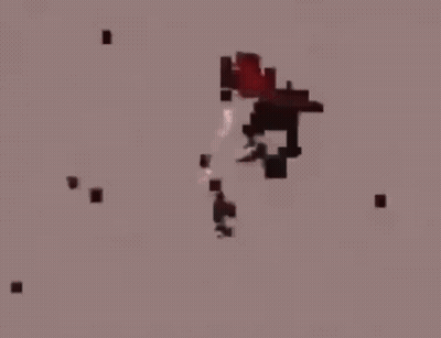 A Person Is Standing In A Dark Room With A Red Light Coming From The Ceiling . GIF