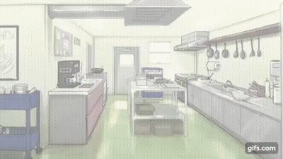 A Person Is Standing In A Kitchen With A Lot Of Utensils Hanging From The Ceiling . GIF