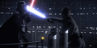 A Person Is Standing In Front Of A Blue Light That Is Shining On Them GIF