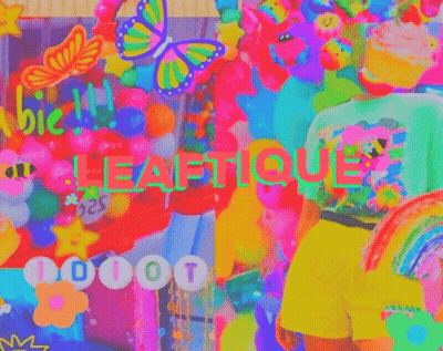 A Person Is Standing In Front Of A Colorful Wall With Balloons And The Word Leafique On It . GIF